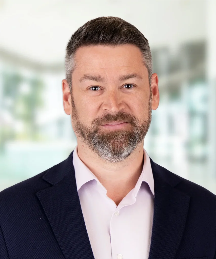 A headshot of Ben Cohn.