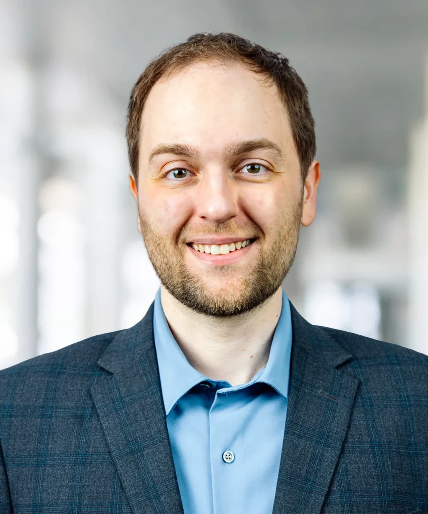 A headshot of Eric Muller.