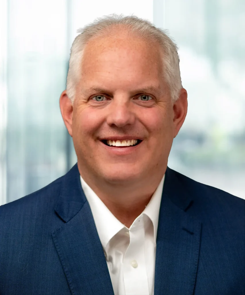 A headshot of Jason Kadow.