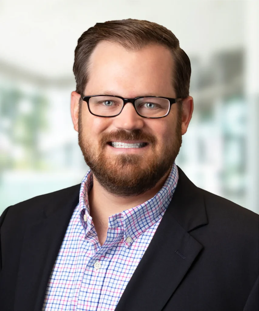A headshot of Joe Fullerton.