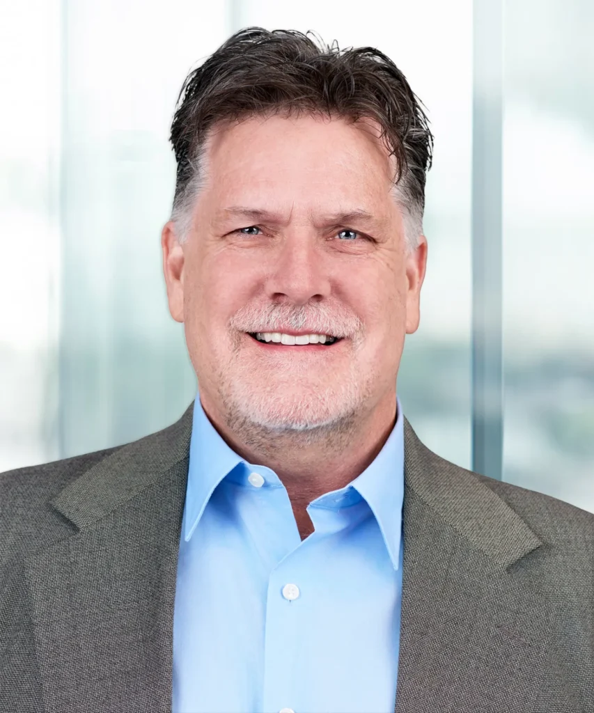 A headshot of John Beall.