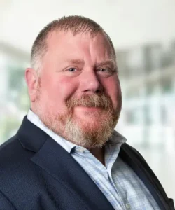 A headshot of Josh Moore.