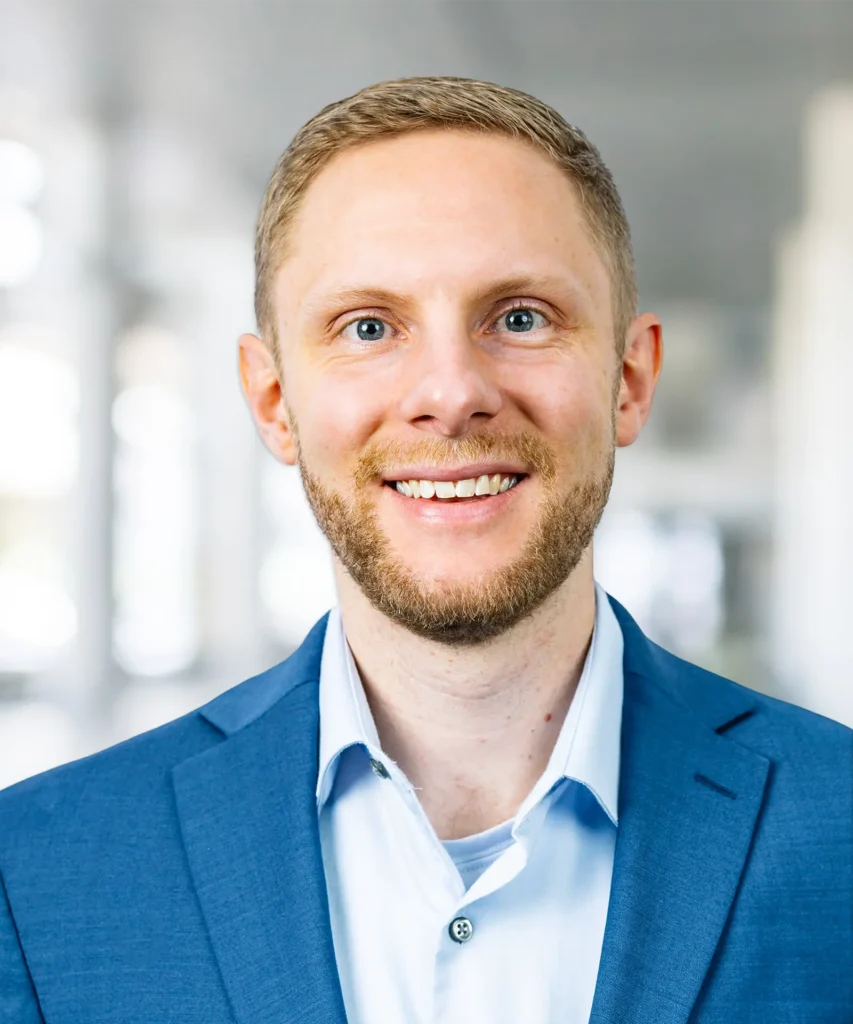 A headshot of Josh Olson.