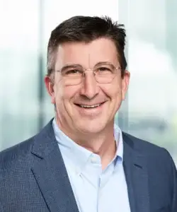 A headshot of Matthew May.