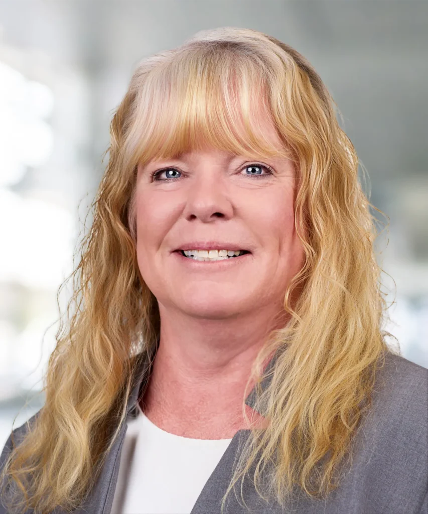 A headshot of Susan St. Range.
