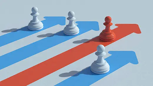 A red chess pawn advancing on a red arrow ahead of white pawns on blue arrows, symbolizing a successful business exit planning strategy.
